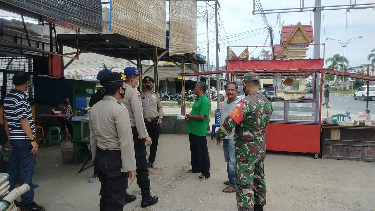 Sosialisasi Prokes kepada Masyarakat, Polsek Pangkalan Kerinci Gencar Patroli