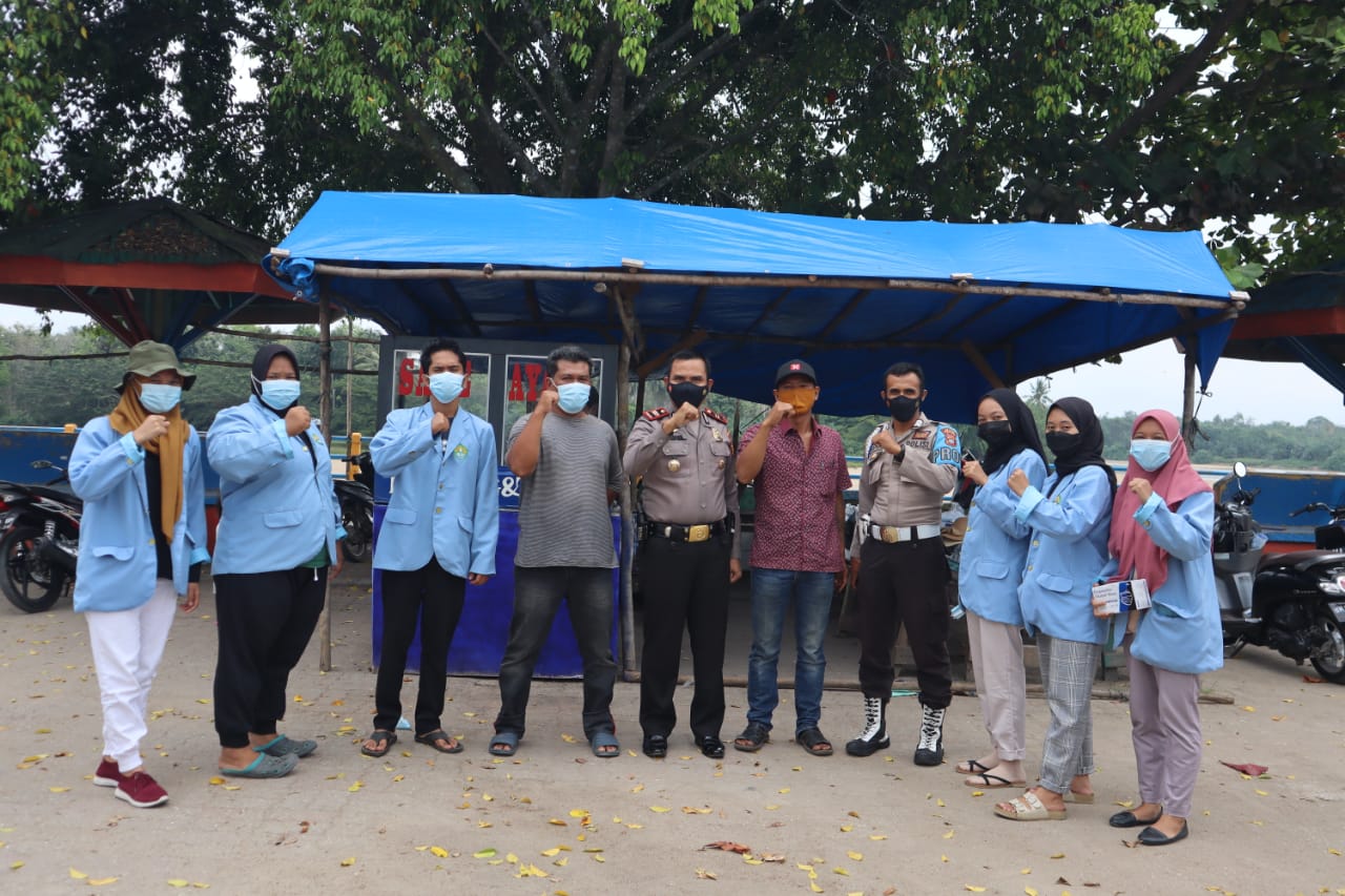 Sosialisasi Penanganan Covid-19, Mahasiswa Kukerta Unri Bagikan 1.000 Masker di Baserah