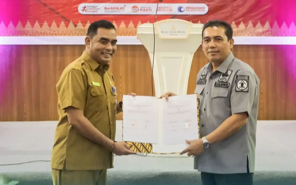 Meningkatkan Pelayanan Terpadu, DPMPTSP Pekanbaru dan Kemenkumham Kantor Wilayah Riau Tandatangani PKS