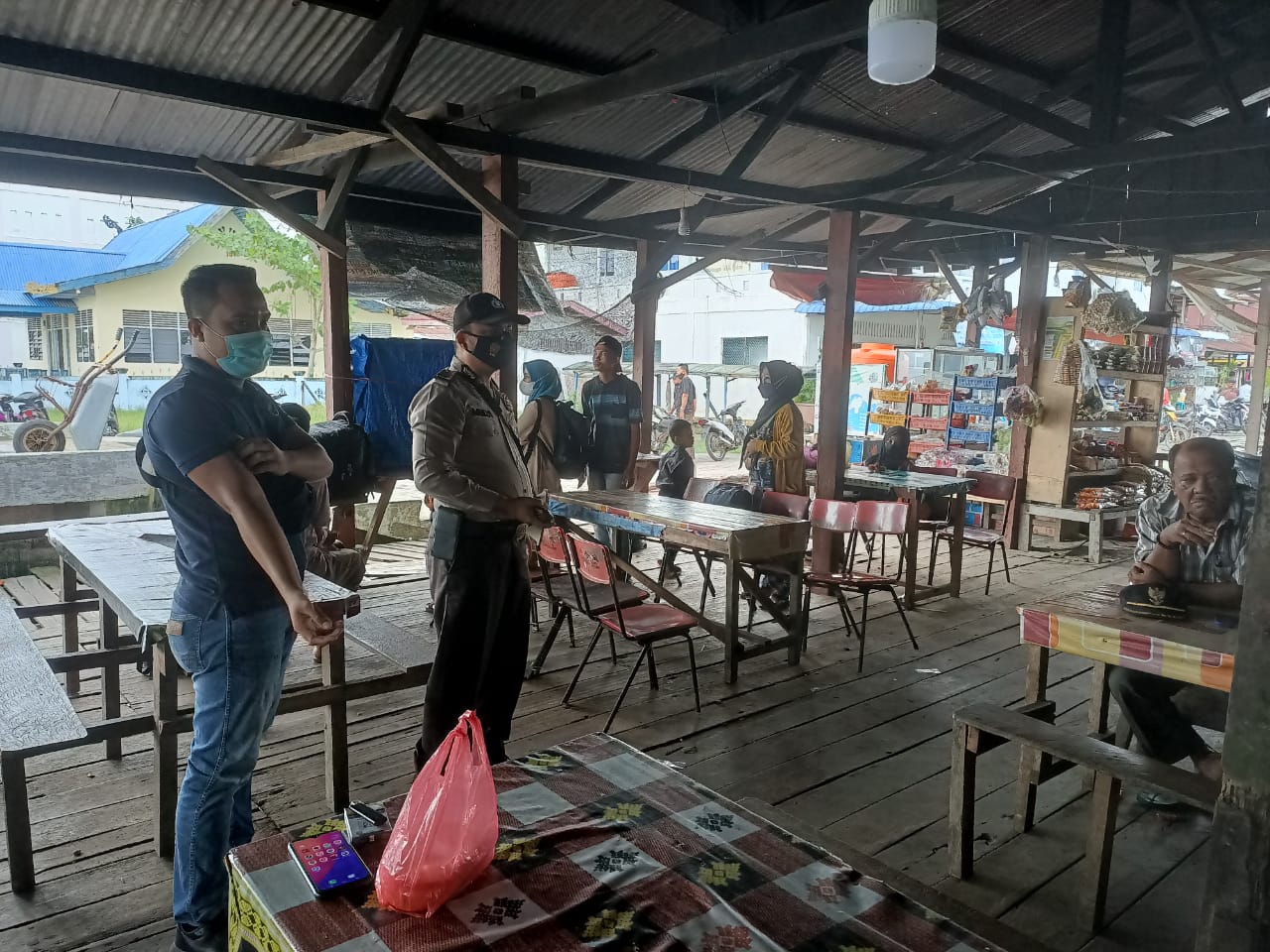 Perketat Pengawasan Covid-19, Polsek Kuala Kampar Pantau Prokes Warga di Pos Pantau