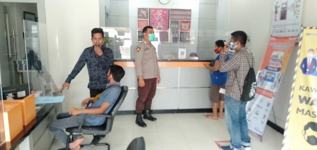 Polsek Langgam Rutin Lakukan Patroli dan Sosialisasi Covid-19