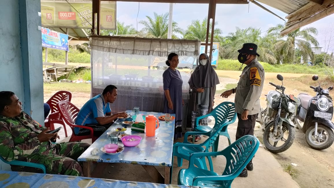 Polsek Teluk Meranti Kembali Razia Masker di Seputaran Lintas Bono Pelalawan
