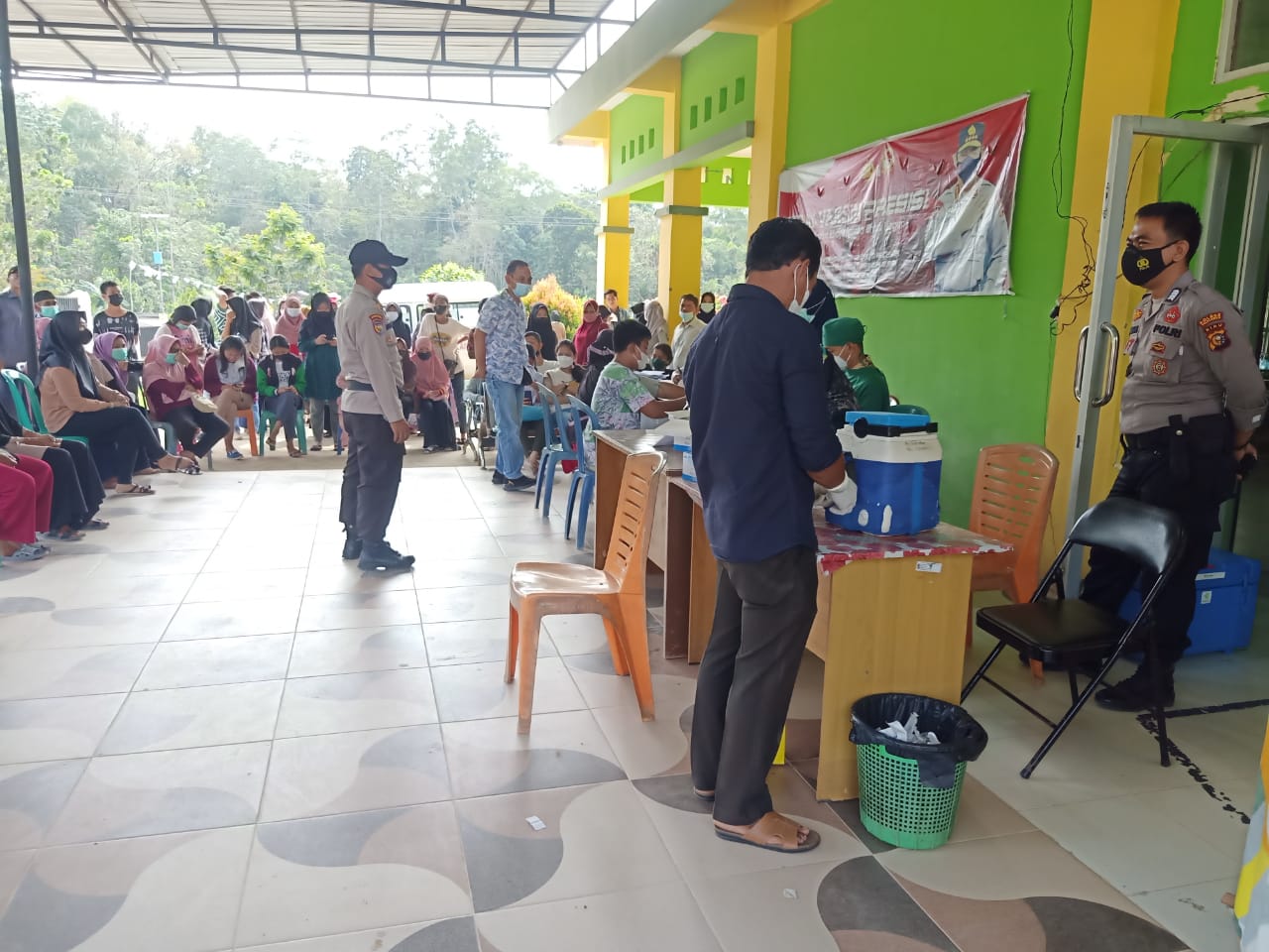 Jamin Kesehatan Warga, Polsek Pangkalan Lesung Monitor Kegiatan Vaksinasi di Puskesmas