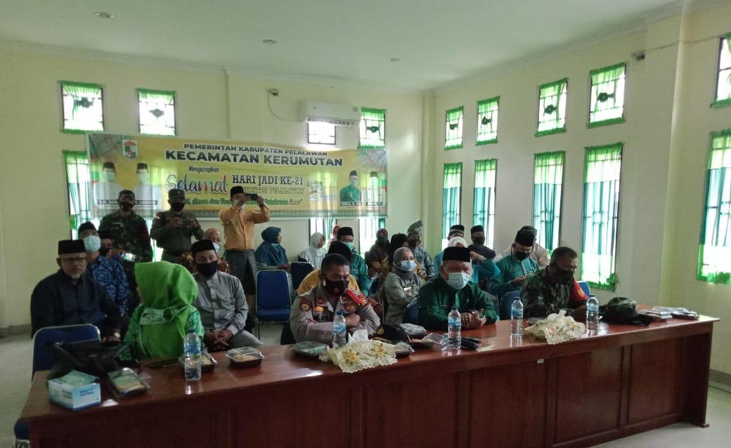 Kapolsek Kerumutan Hadiri HUT Kabupaten Pelalawan ke-21 di Aula Kantor Camat Kerumutan