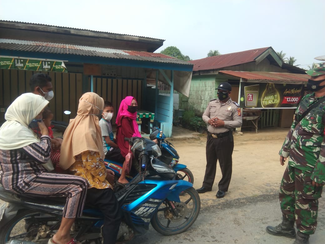 Polsek Kerumutan Kembali Turun ke Jalan Sosialisasikan Prokes