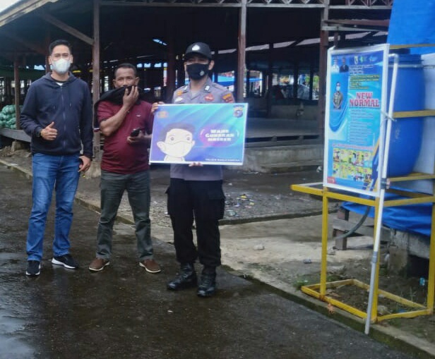 Personel Polsek Kuala Kampar Ingatkan Warga Patuhi Protokol Kesehatan
