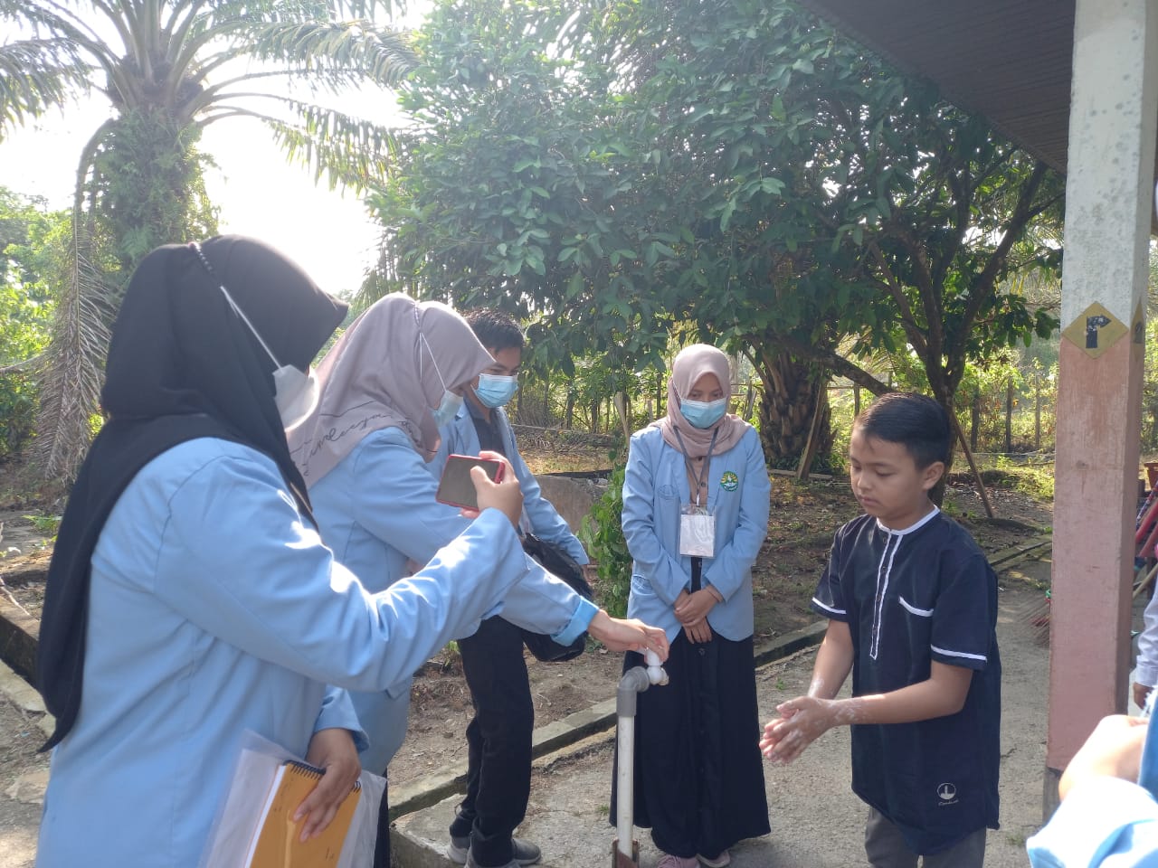 Mahasiswa Kukerta Unri Desa Pembatang Sosialisasi Pencegahan Covid-19