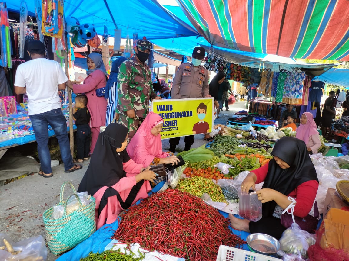 Polsek Bunut Imbau Warga Pasar Agar Terapkan Prokes