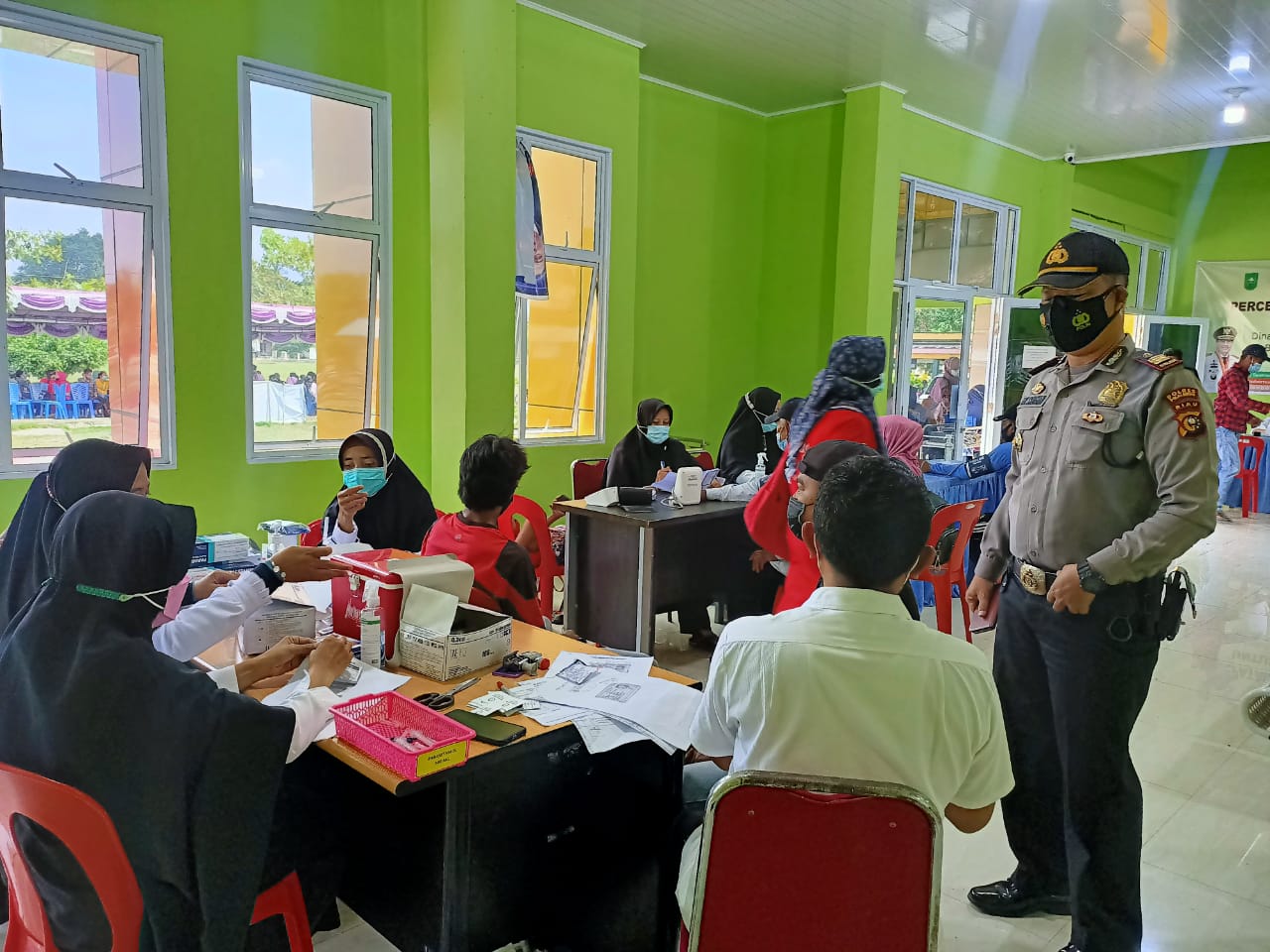 Kapolsek Kuala Kampar Pimpin Langsung  Pengamanan Giat Vaksinasi