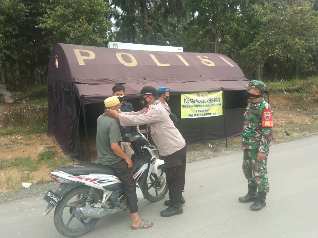 Polsek Kerumutan Gelar Giat PPKM Pasar Induk Lingkungan IV Bukit Garam