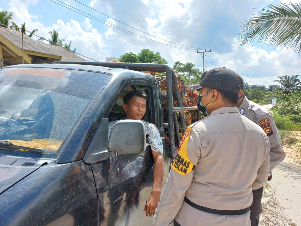 Pantau Prokes Masyarakat, Polsubsektor Pelalawan Gencar Operasi Yustisi