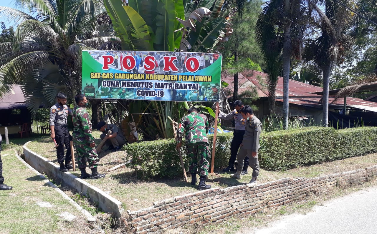 Putus Penyebaran Corona, Bhabinkamtibmas dan Instansi Terkait Dirikan Posko