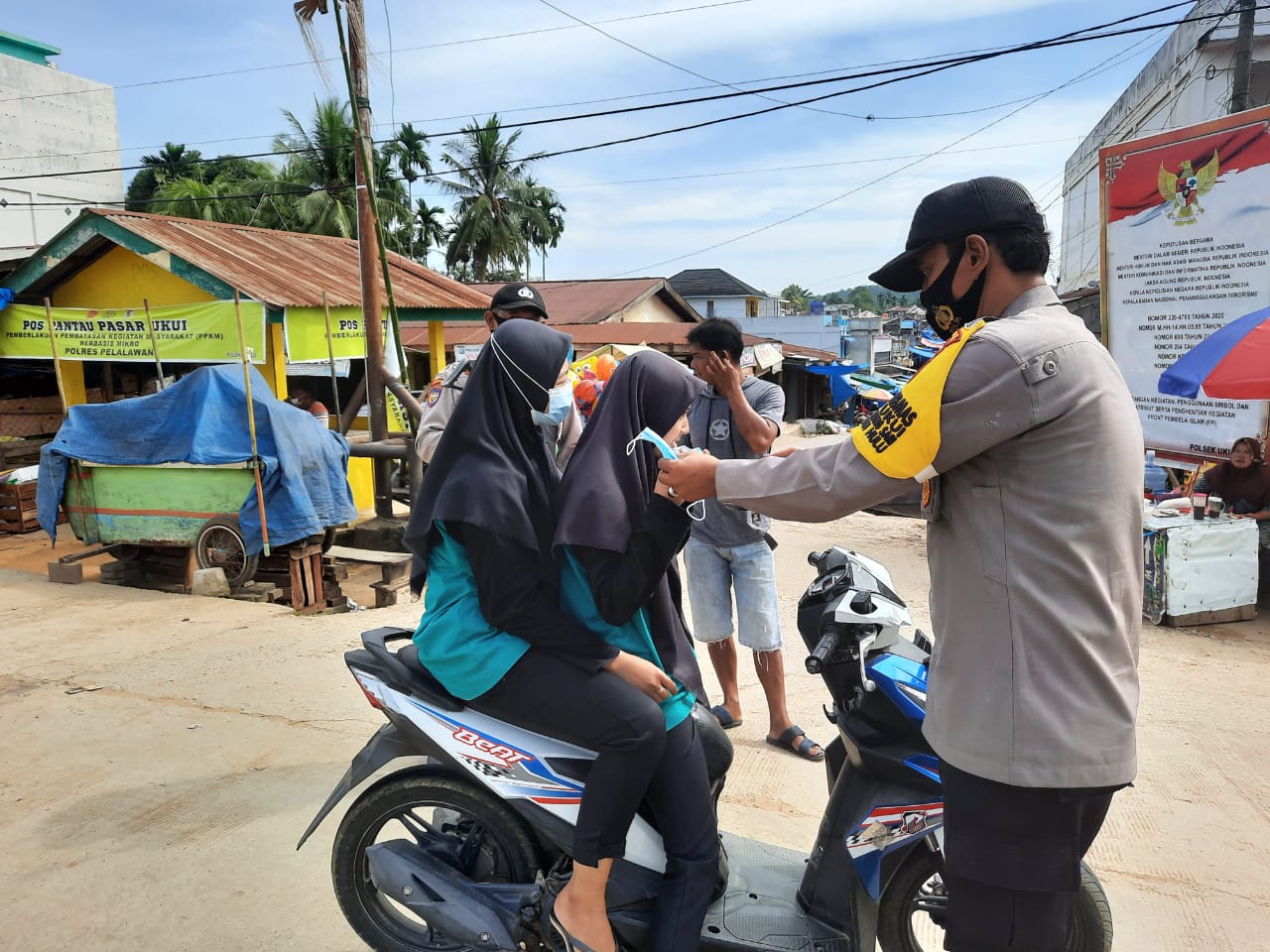 Polsek Ukui Tingkatkan Disiplin Masyarakat Patuhi Protokol Kesehatan