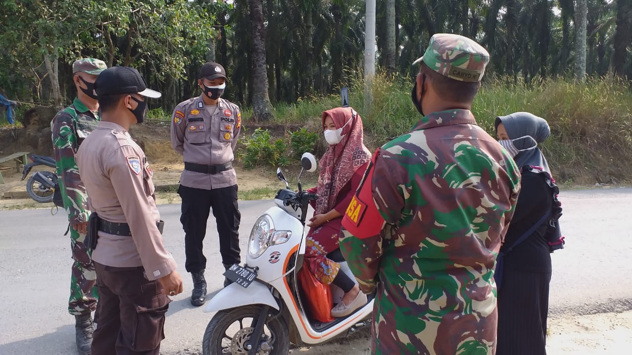 Polsek Kerumutan Minta Warga Terapkan Prokes