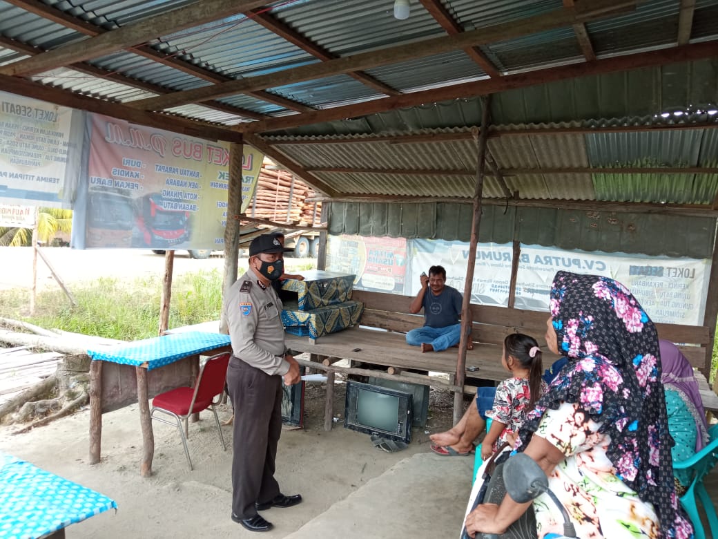 Antisipasi C3 dan Sosialisasikan Prokes, Polsek Langgam Gelar Patroli