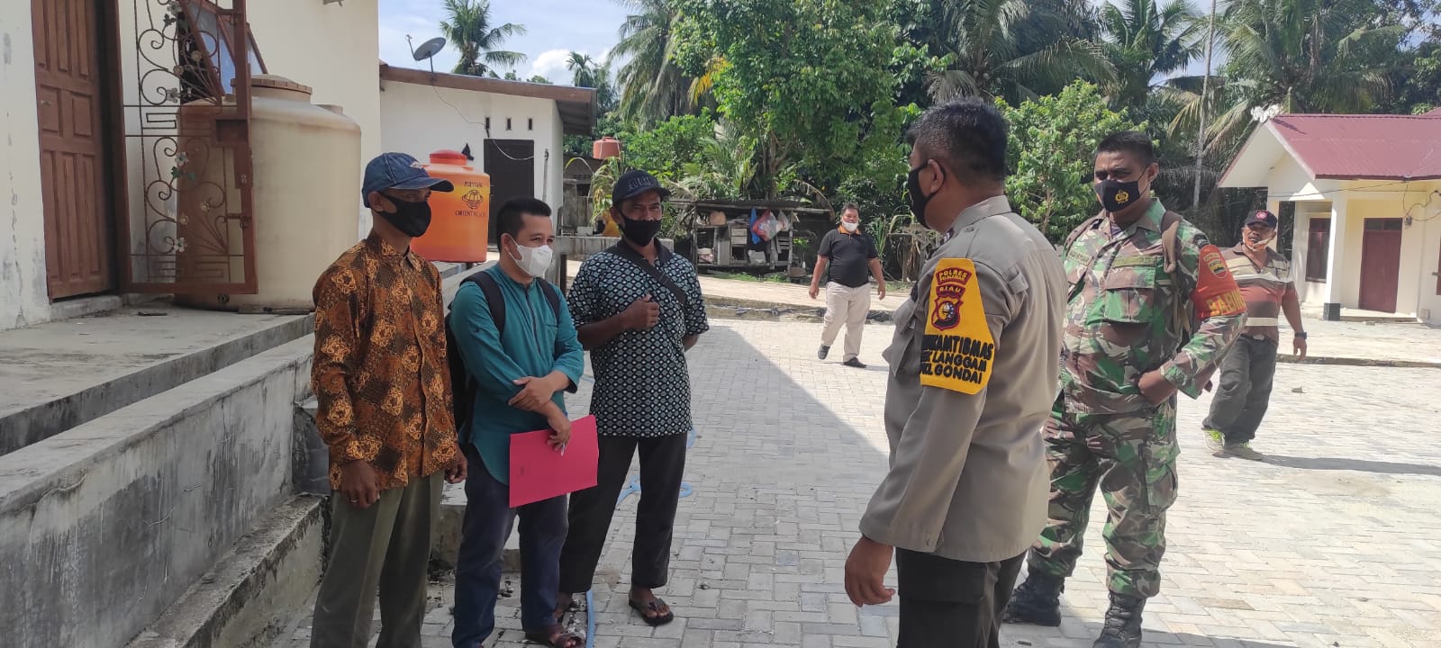 Polsek Langgam Imbau Warga Desa Segati Waspada Covid-19 dan Tindak Aksi Kriminal