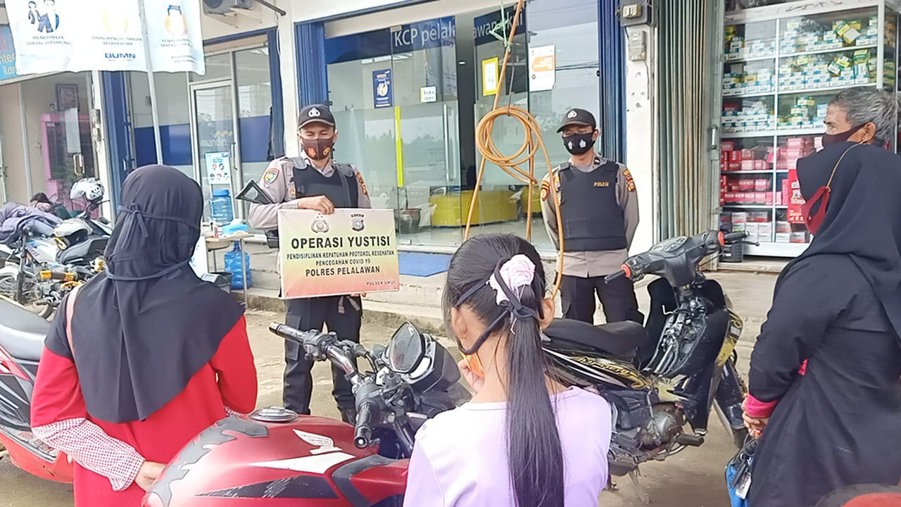 Dukung Pemerintah Penanganan Covid-19, Polsek Ukui Sosialisasikan Prokes