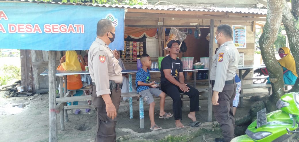 Cegah Tindak Kejahatan dan Covid-19, Polsek Langgam Gencar Lakukan Patroli