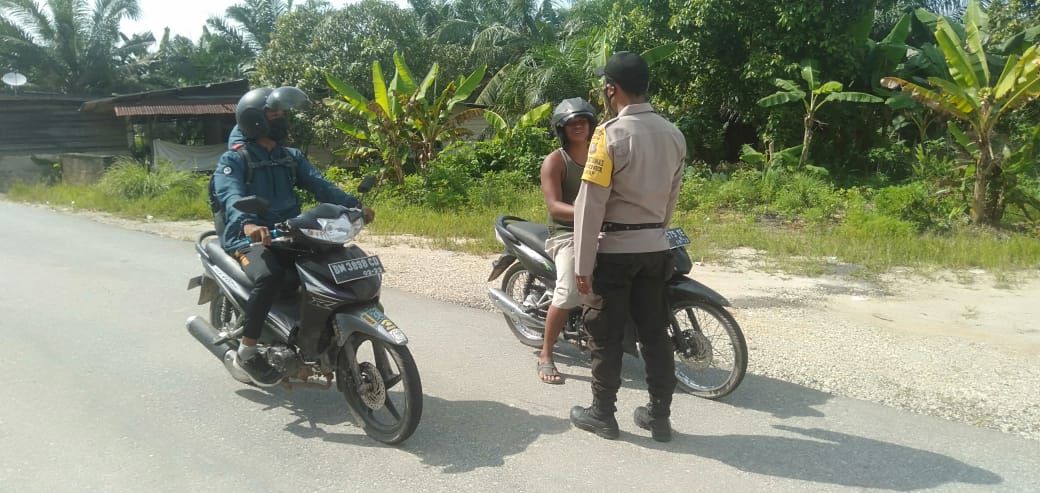 Monitor Prokes di Wilayahnya, Polsubsektor Pelalawan Laksanakan Yustisi