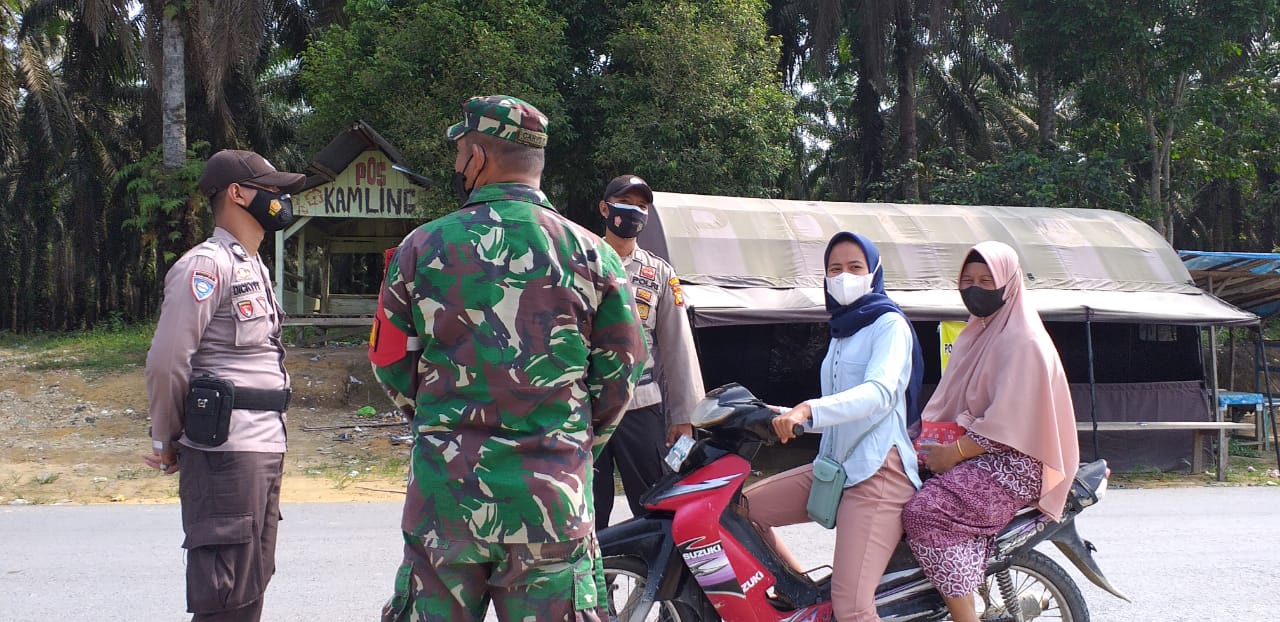 Pantau Kepatuhan Prokes Warga, Polsek Kerumutan Adakan Operasi Yustisi