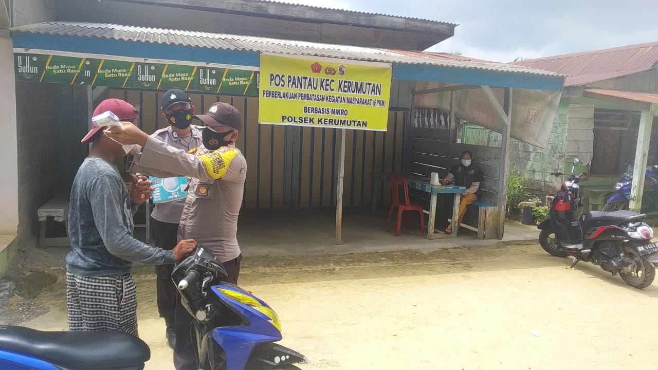 Polsek Kerumutan dan Pihak Puskesmas Kecamatan Gencar Sosialisasi Prokes