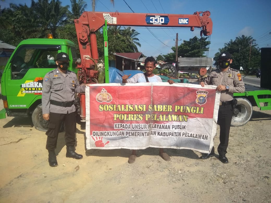 Berantas Pungli, Polsek Bandar Sei Kijang Beri Sosialisasi kepada Warga