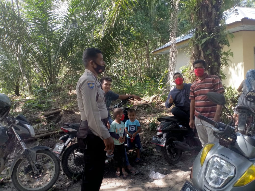 Personil Polsek Langgam Lakukan Rutinitas Patroli C3 dan Sosialisasi Antisipasi Penyebaran Covid-19