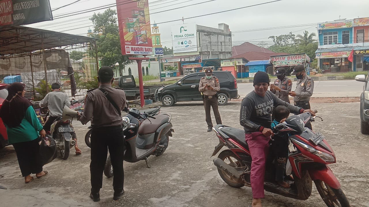 Gencar Menerapkan Prokes, Polsek Pangkalan Kuras Polres Pelalawan Tetap lakukan Operasi Yustisi