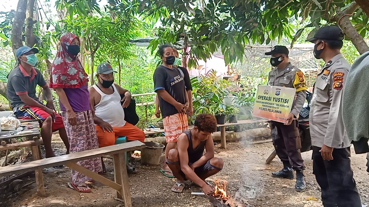 Tekan Penyebaran Covid-19, Polsek Ukui Rutin Gelar Operasi Yustisi di Kelurahan Ukui