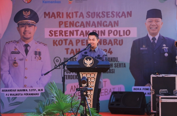 Pj Wako Buka Pencanangan Serentak PIN Polio 2024 di Pekanbaru