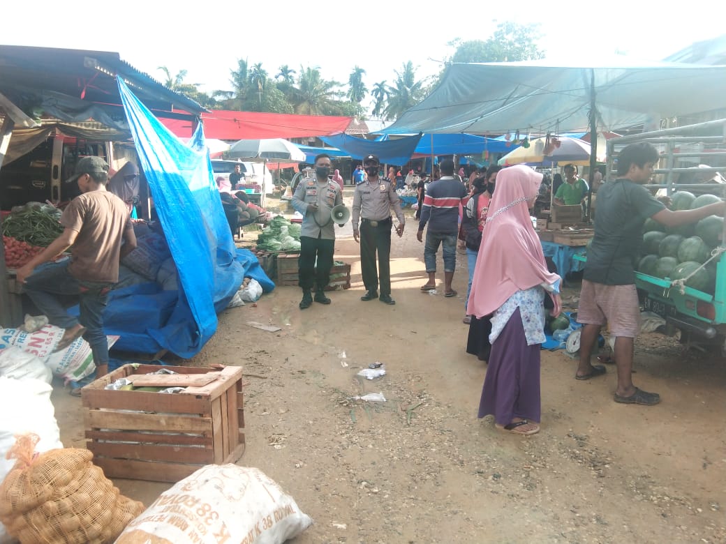 Bebaskan Kerumutan dari Covid-19, Polsek Kerumutan Terus Disiplinkan Protokol Kesehatan