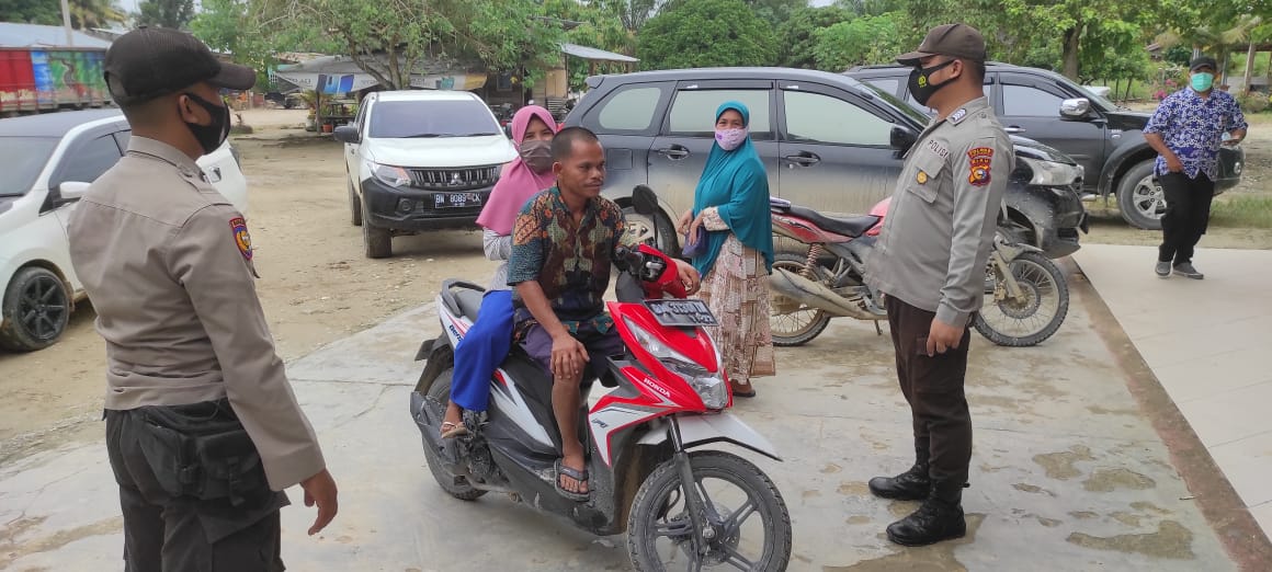 Polsek Langgam Gelar Patroli untuk Cegah Kriminal dan Tekan Penyebaran Covid-19